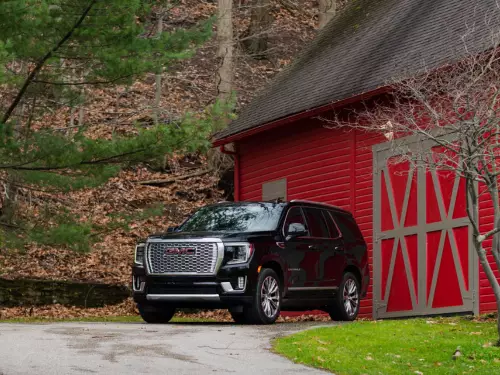 Black GMC SUV in Front of House Red Gate Atlanta GA